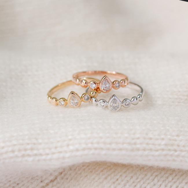 Bezel pear diamond ring